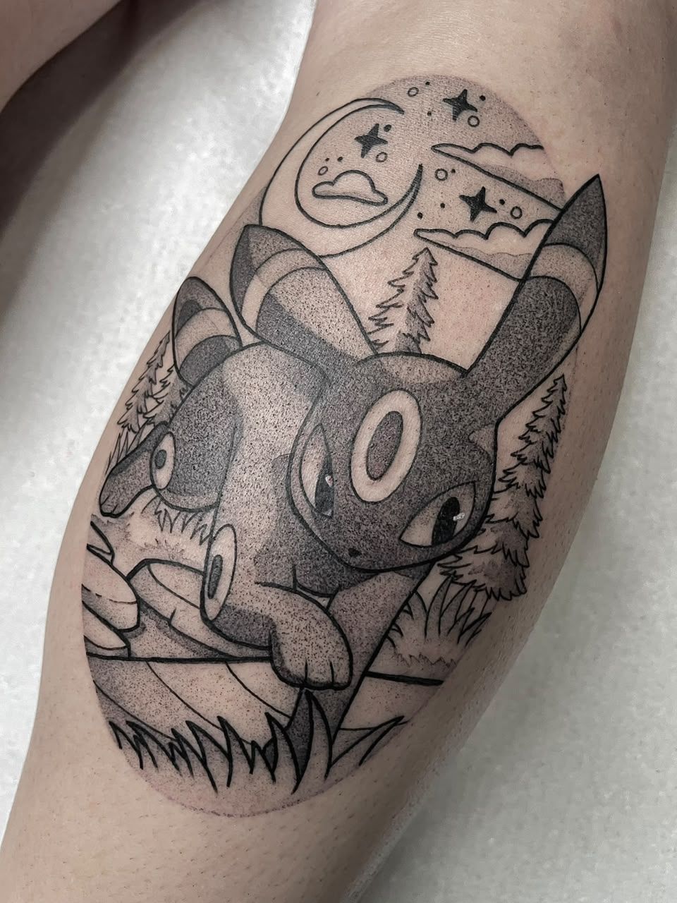 Umbreon com lua e estrelas